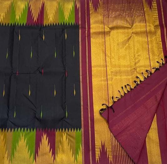 Ettukol Karuppu — Pure Silk Kanchipuram
Inky-black body with parrot-green & mustard buttas, korvai temple peaks in gold, wine & green ✨
Silk Mark Certified • Ships in Two Weeks • Free Shipping within USA