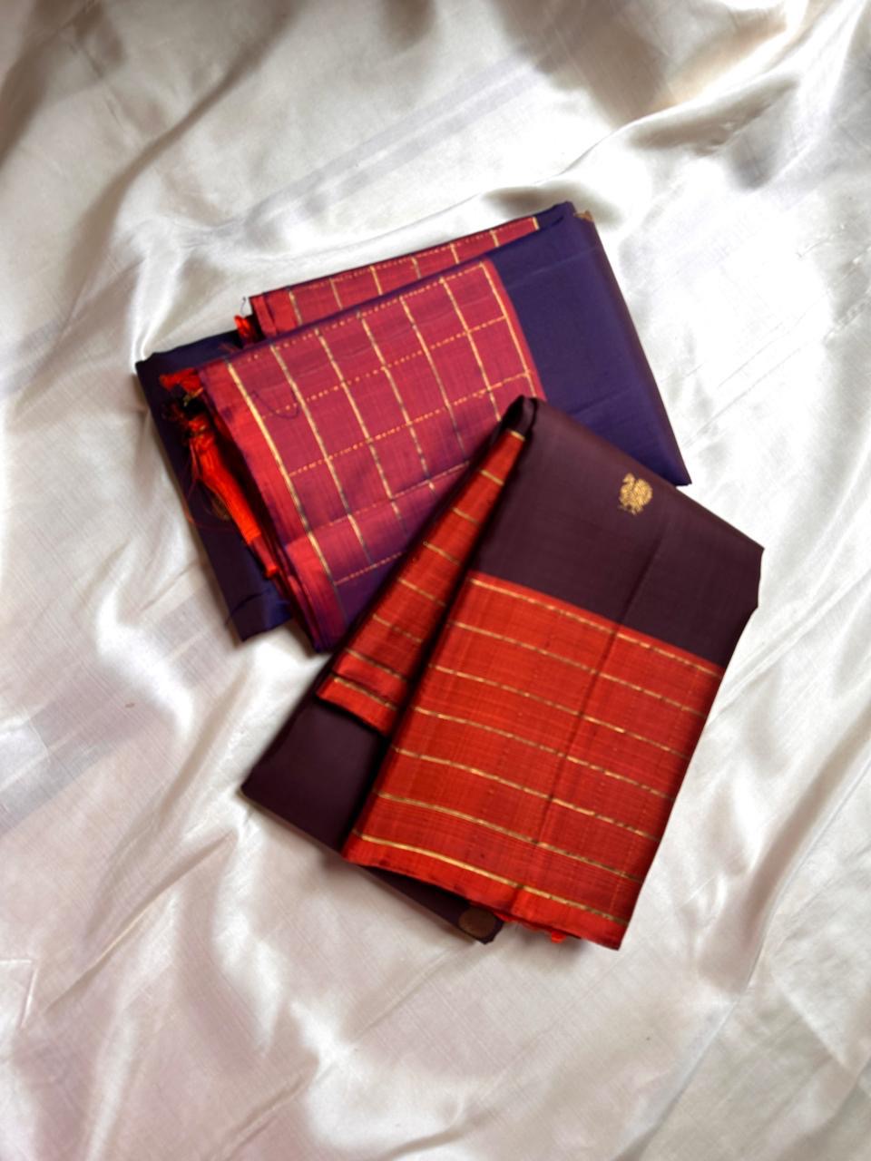 Minmini – Deep Purple Pure Kanchipuram Silk Saree with Gold Zari Buttas, Fiery Orange Checked Zari Border & Rich Gold Brocade Pallu with Traditional Motifs