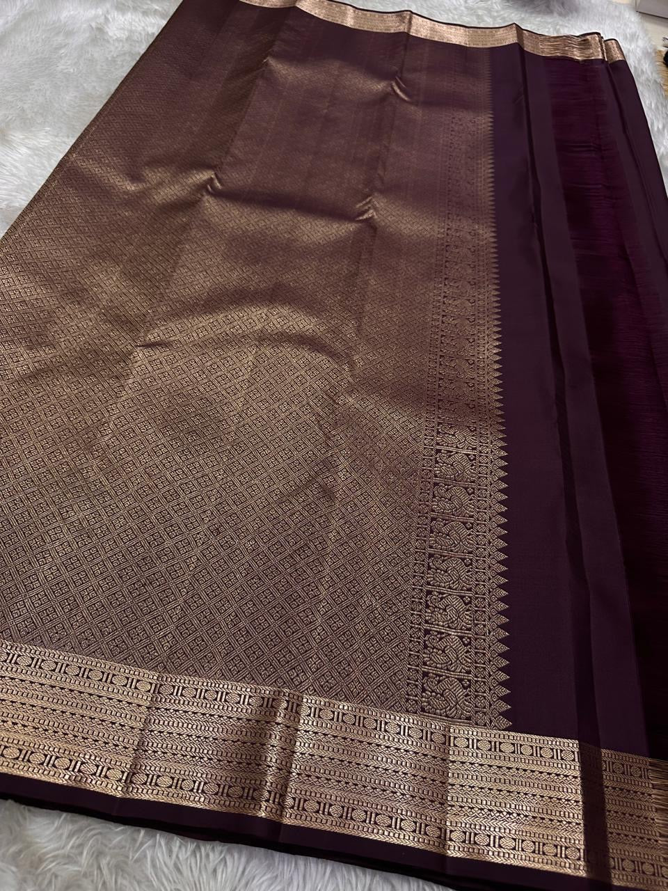 Vibha coffee Brown Pure Kanchipuram Silk Saree Blending the Grandeur of South Indian Weaving with Paithani-Inspired Floral Zari Borders and a Lustrous Rose Gold zari Pallu