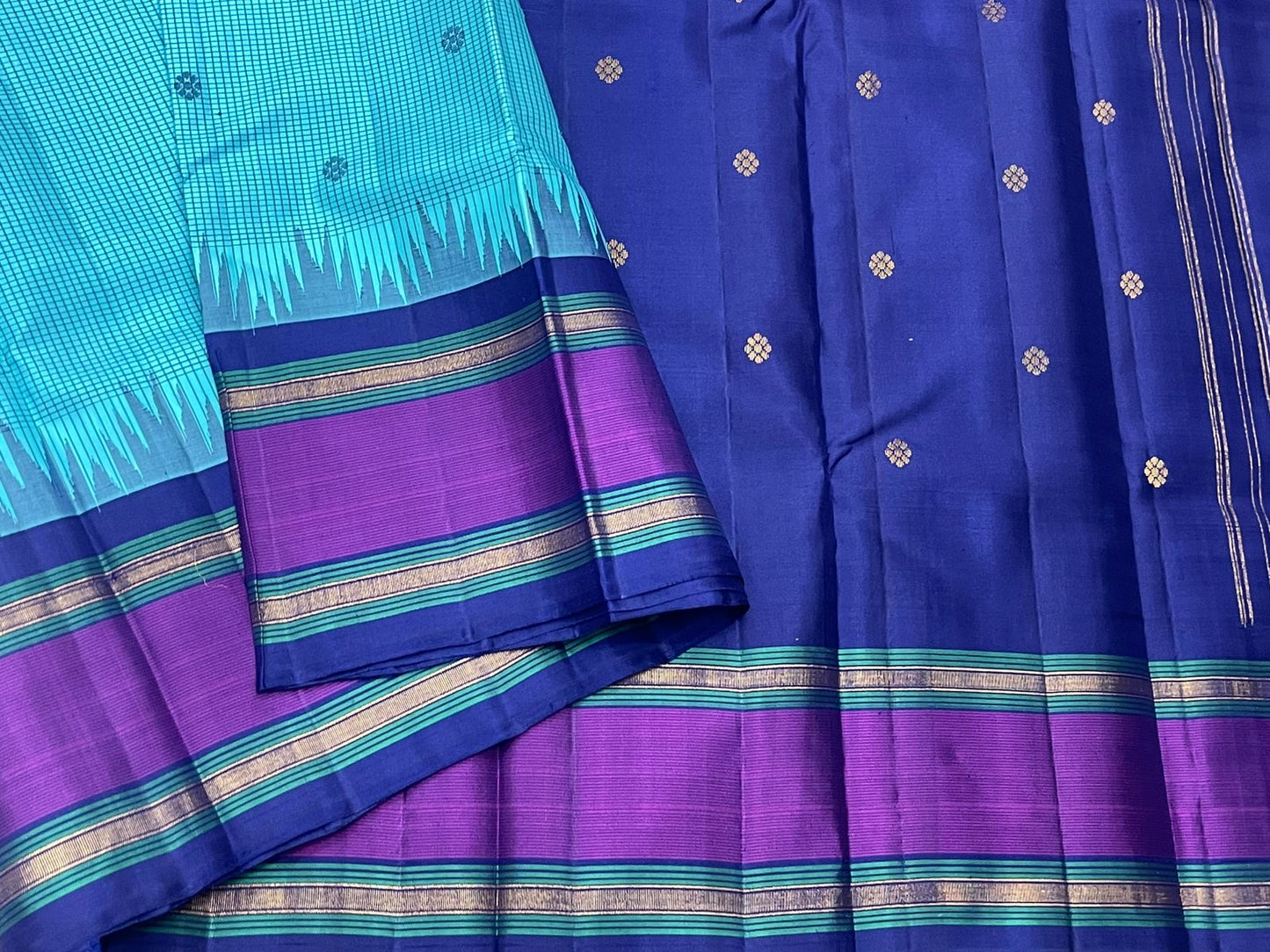 Amethyst Neelam • Pure Silk Kanchipuram Saree
Aqua–Teal Body with Silk-Thread Buttas • Navy Pallu & Amethyst Borders
Silk Mark Certified • Free USA Shipping • Ships in Two Weeks ✅