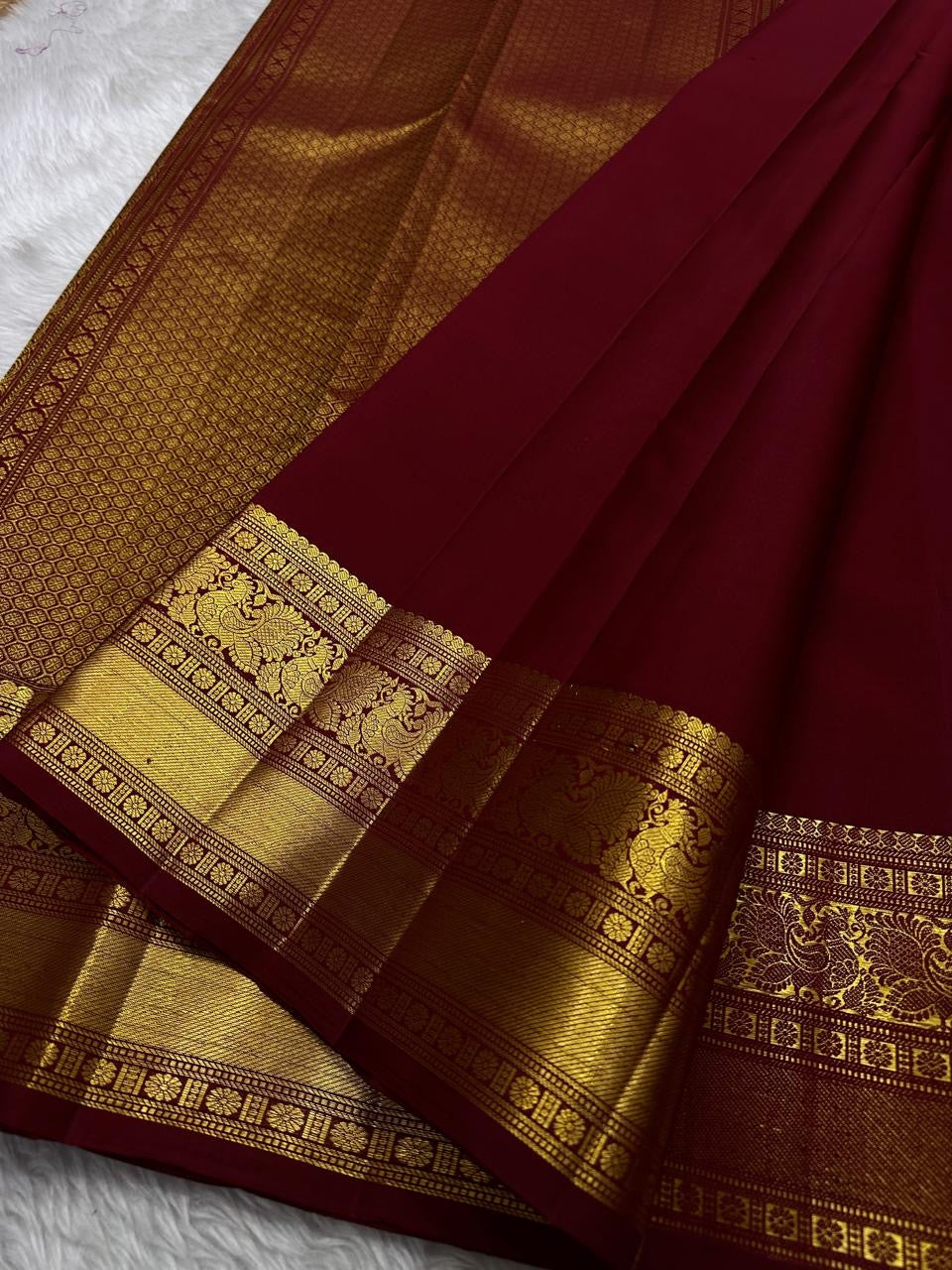 Deep brown small flower motif with vanasringaram and Rudhraksham border pure silk mark certified Kanchipuram saree