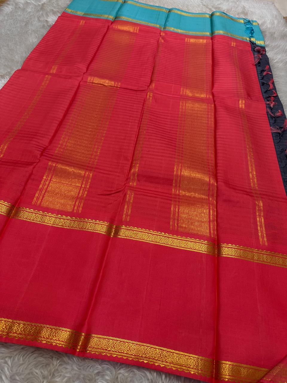 Yamini – Navy Blue Pure Silk Kanchipuram Saree with Ganga Jamuna rettapet Zari Borders
Bold and elegant, Yamini is a handwoven pure silk saree featuring a rich navy blue body with subtle thread detailing, beautiful seer Pallu
