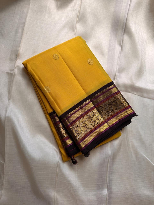 ✨ ✨ Mangalarupa — Pure Silk Kanchipuram Saree ✨
Haldi yellow with gold buttas, aubergine–magenta korvai borders & yaali zari pallu.
Silk Mark Certified ✅ • Free Shipping within USA 🇺🇸 • Ships in 1 Week ✅