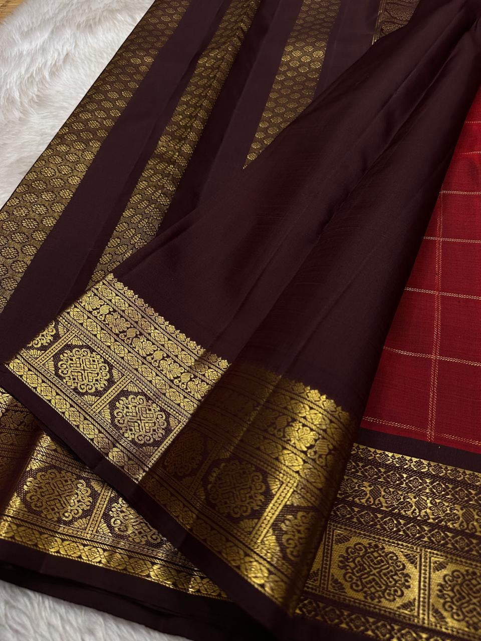 Arakku maroon Zari kattam pure silk Kanchipuram with Zari motifs and varisaipet border and ornate palla