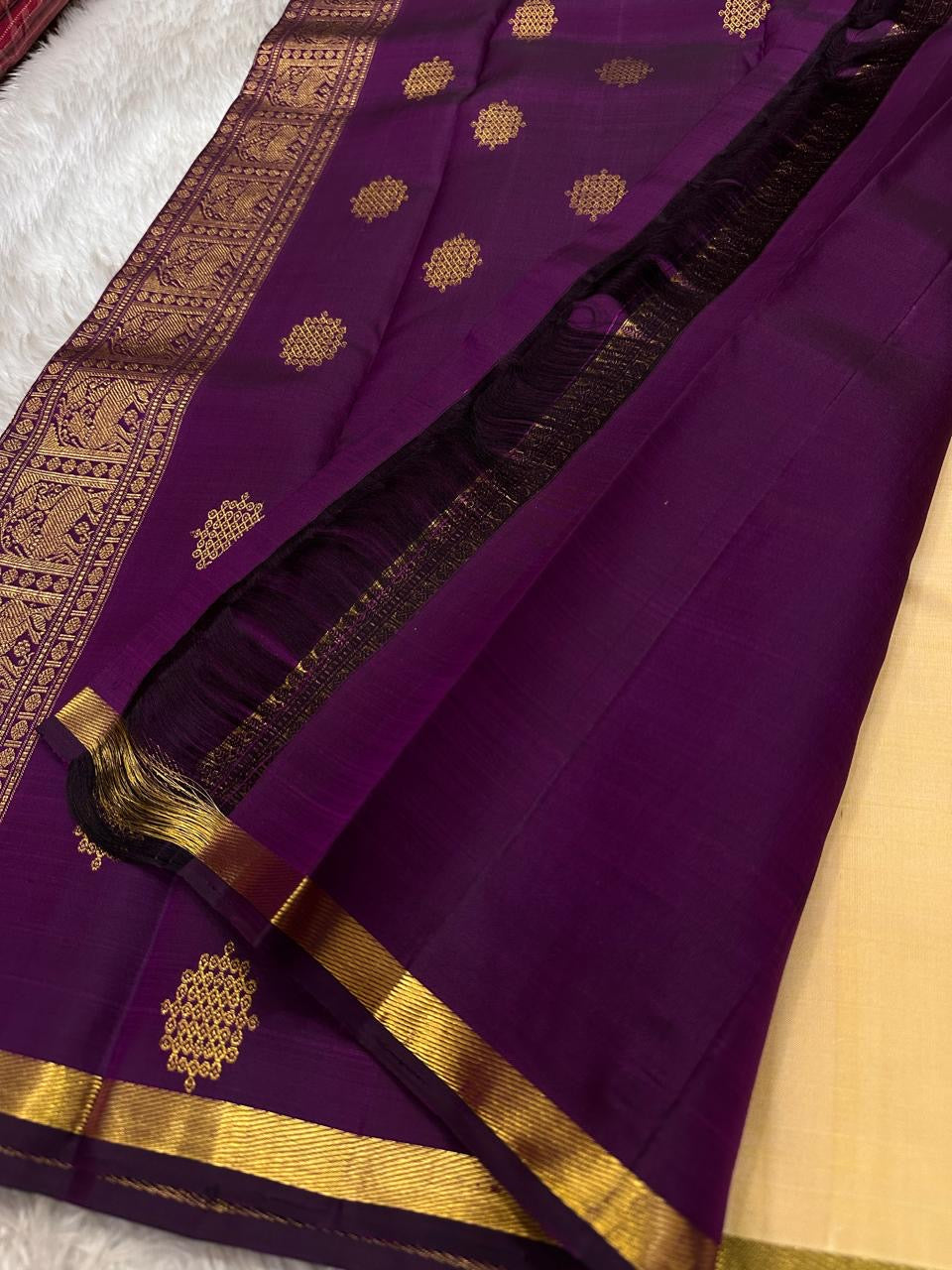 Half white cream purple selvedge and border with overall kolam woven motif in pure silk Kanchipuram saree