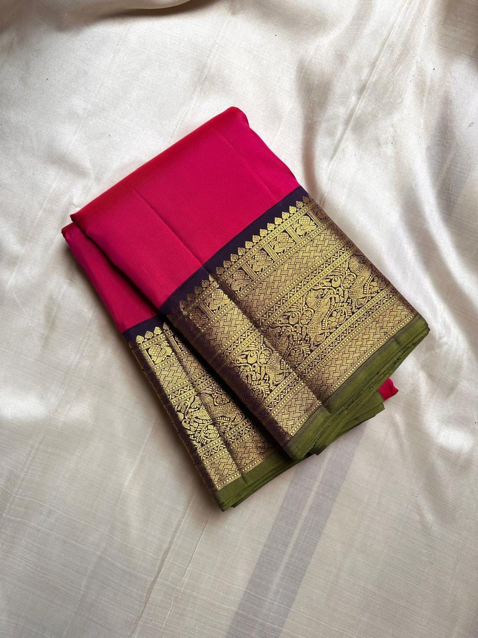 vibrant bright fuschia pink , purple vanasringaram border with a green selvedge !
