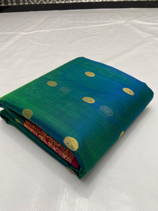 Peacock green shot blue with red zari border zari butta pure silk chanderi saree