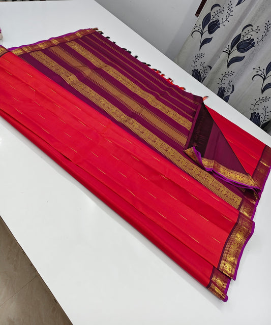 Mullai Moggu Pink — Pure Kanchipuram Silk Saree
Vibrant mullai-pink body with zari mullai bud buttas & plum-purple zari borders
Grand plum pallu with floral vines • Silk Mark Certified • Free Shipping within USA • Ships in Two Weeks