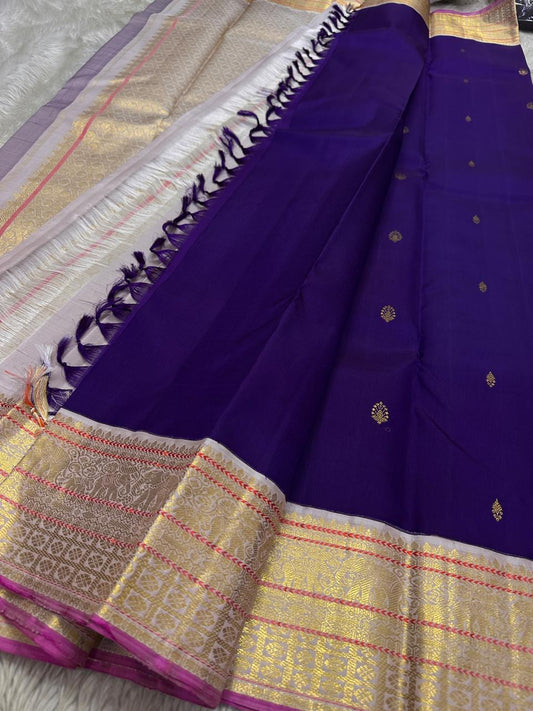 Shubra — Pure Silk Kanchipuram Saree
Royal Purple with Gold Buttas & Silver-White Tissue Border ✨
Silk Mark Certified • Fall & Pico Done • Free USA Shipping • Ships in Two Weeks ✅