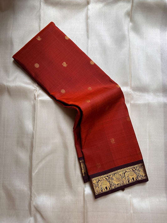Rust Orange Kili — Pure Silk Kanchipuram Saree
Rust-orange body with gold zari kili (parrot) motifs ✨
Deep coffee-brown korvai borders & grand brocade pallu
Silk Mark Certified • Ships in Two Weeks • Free Shipping within USA