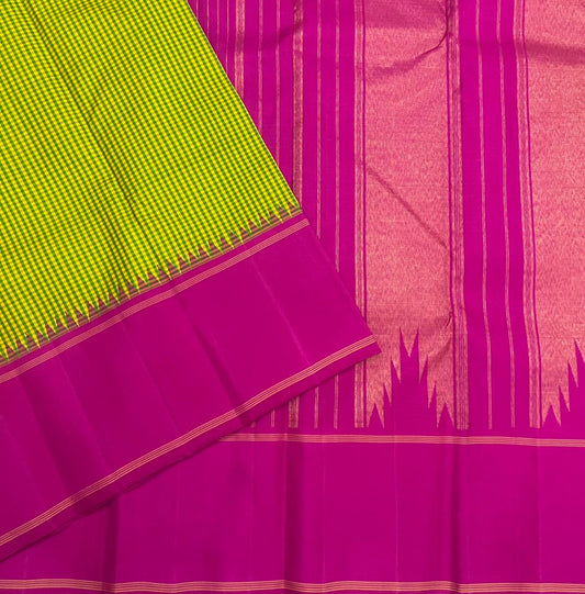 Rose Garden | Korvai Kanchipuram Pure Silk Saree
Magenta-rose body with parrot green micro-checks & temple Korvai join
Rettai pettu striped zari pallu | Contrast magenta blouse
Silk Mark Certified | Dry clean only
Ships in 1 week | Free Shipping USA