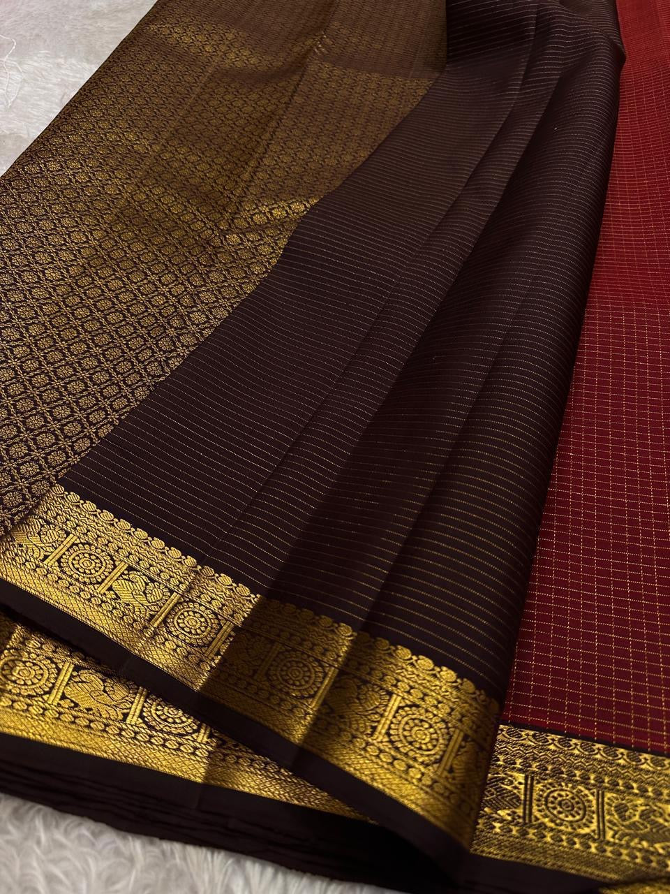 Maroon kattam wirh deep coffee brown shot purple silk Kanchipuram saree with vanasringaram border and Pallu