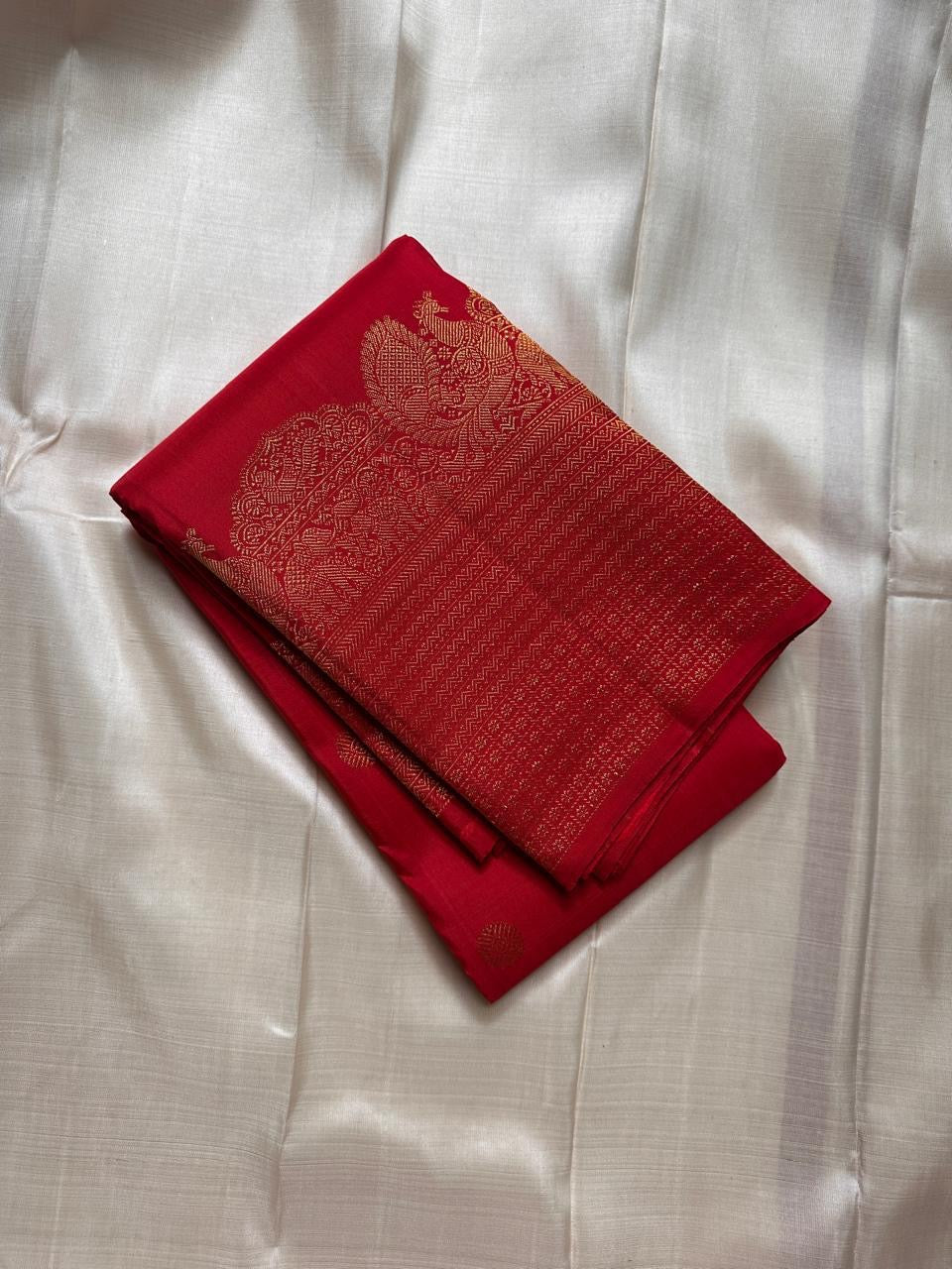 Lotus glow -radiant vermillion red  body with lotus gold zari buttas 🌸
Majestic peacock panel pallu in antique gold jaal and temple border artistry ✨
Silk Mark Certified ✅ | Ships in 2 Weeks | Free Shipping within USA 🇺🇸