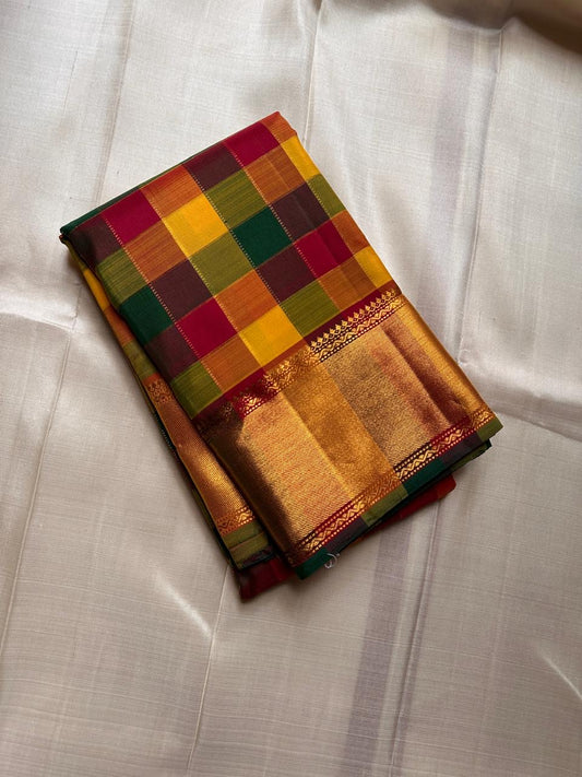 Manjal–Kumkumam Paalum pazhamum Kattam | Pure Silk Kanchipuram
Haldi Yellow • Kumkum Red • Tulasi Green Paalum-Pazhamum Checks
Korvai Maroon Border • Rich Gold Zari • seer Zari Pallu with Tassels
Silk Mark Certified • Free Shipping within USA 2 weeks