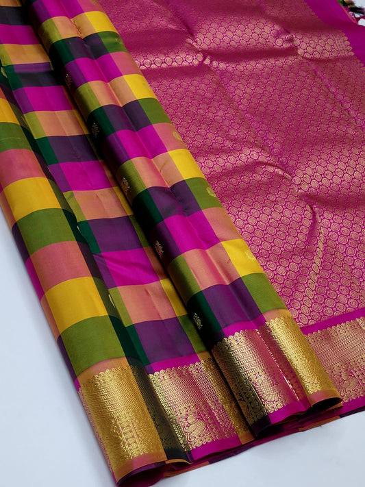 Sunset Mosaic – Paalum Pazhamum – Pure Kanchipuram Silk Saree
Vibrant Multicolored Checks in Yellow, Green, Rust & Maroon
Golden Zari Borders with Traditional Intricate Weaves
Silk Mark Certified, delivery in 2 weeks
