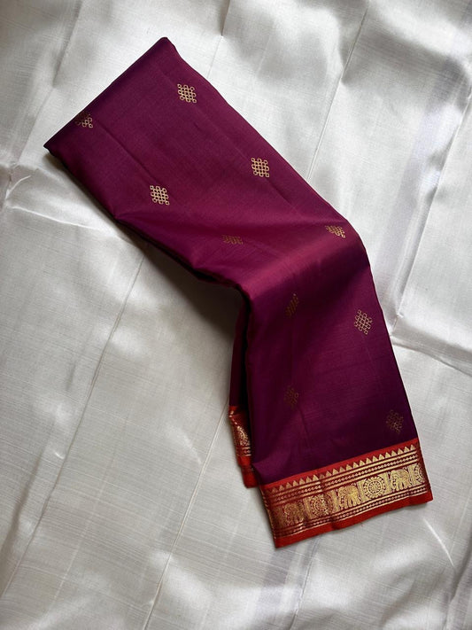 Maroon Kolam Korvai – deep wine-maroon body with tiny kolam buttas
Contrast burnt-orange korvai border with temple triangles & intricate kolam motifs
Silk Mark Certified | Fall & Pico Done | Blouse Stitching Available ($30)
Free Shipping 2 weeks