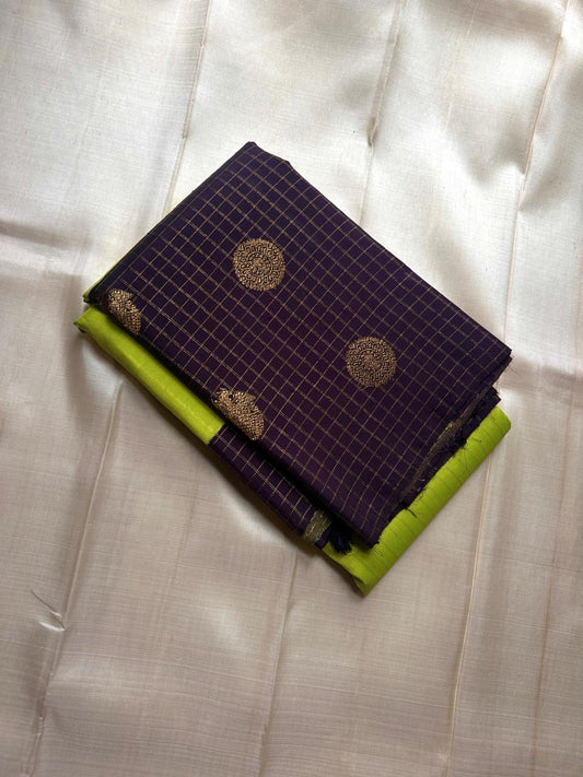 🌿 Venn Pachai – Deep Violet Checks & Lime Korvai Kanchipuram 🌿
✨ Pure Silk | Silk Mark Cert | Handloom Kanjivaram ✨
🪔 Violet & Gold Checks with Rich Zari Pallū | Bright Lime Green Body
🌸 Korvai | woven  Zari Buttas
Gandaberunda
🚚 Ships in 2weeks