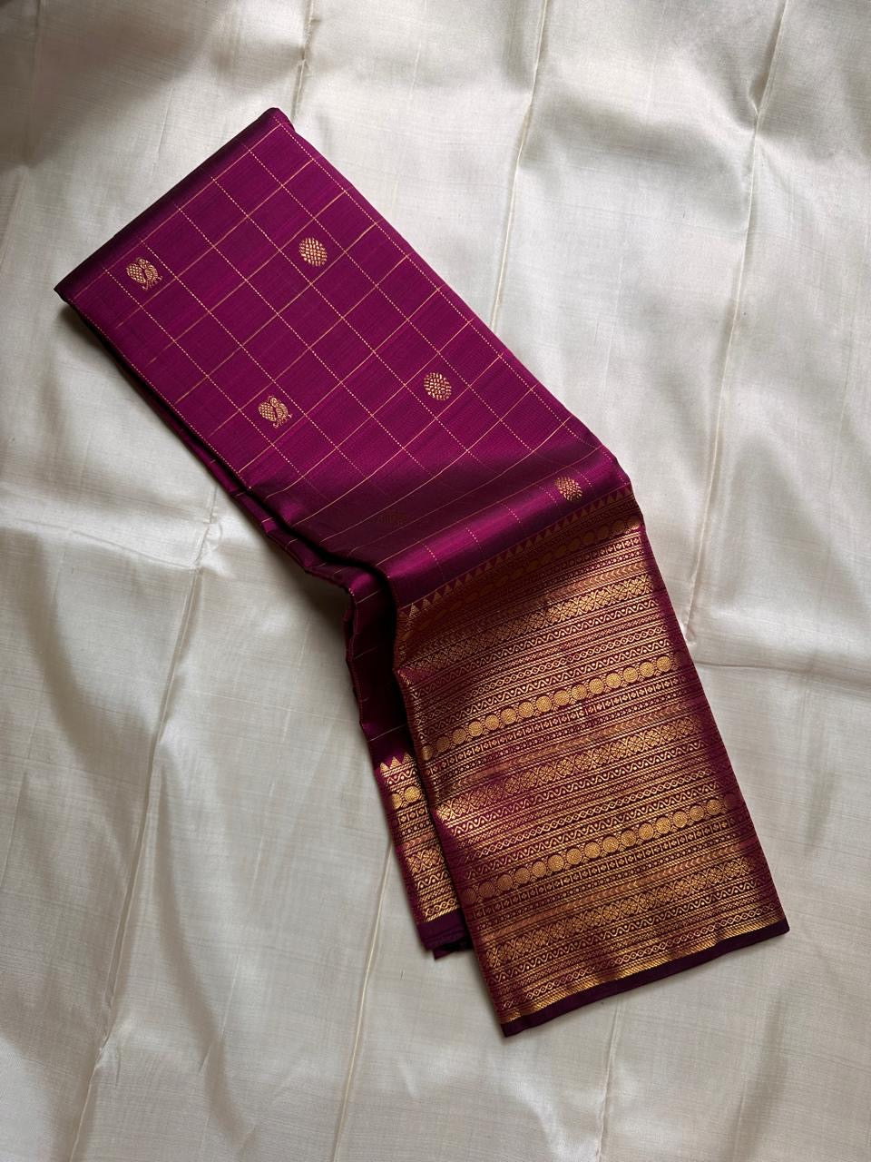 Purple with gold Zari kattam with ornate border pure silk Kanchipuram with mayil chakram zari butta and detailed Pallu