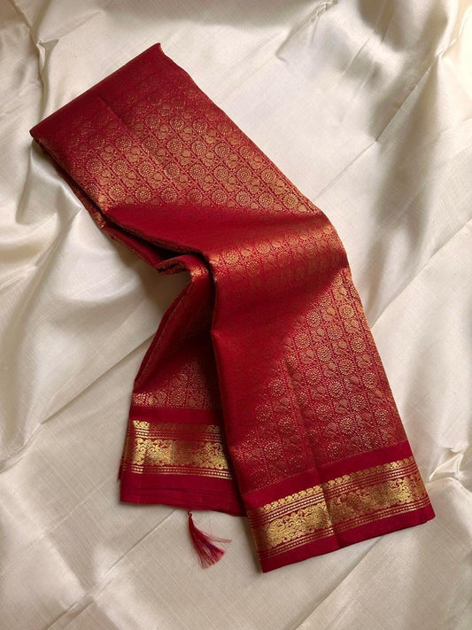 Ratna Rekha — Pure Silk Kanchipuram Saree
Deep kumkum red body with gold coin buttas, rich woven zari jaal pallu, and antique-gold floral borders.
Silk Mark Certified • Blouse Stitching ($30) • Free USA Shipping • Ships in 1 Week