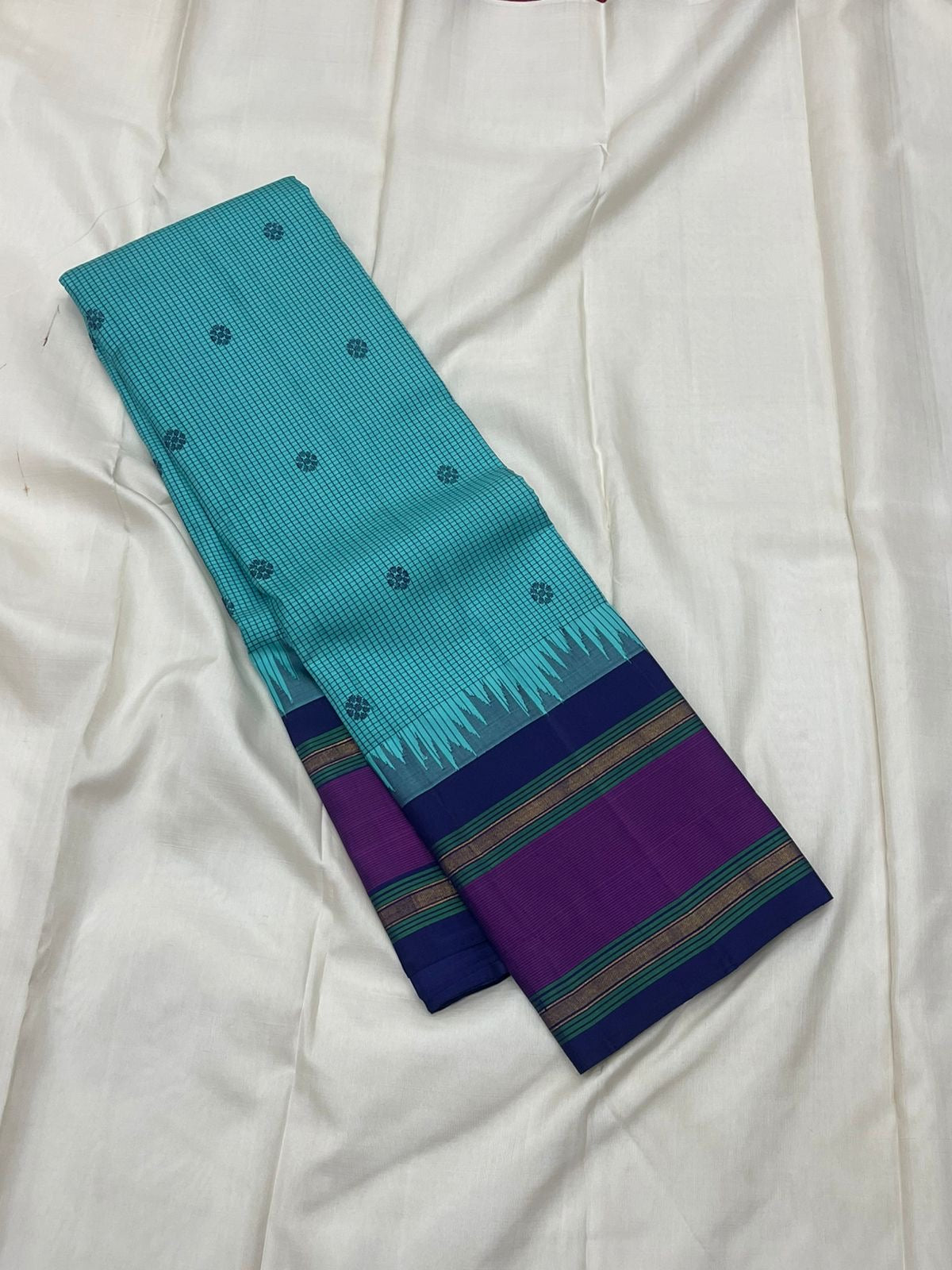 Amethyst Neelam • Pure Silk Kanchipuram Saree
Aqua–Teal Body with Silk-Thread Buttas • Navy Pallu & Amethyst Borders
Silk Mark Certified • Free USA Shipping • Ships in Two Weeks ✅