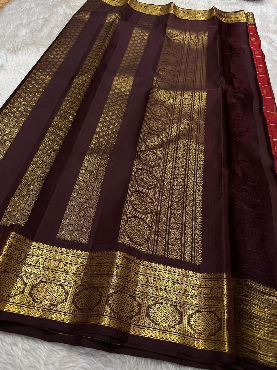 Arakku maroon Zari kattam pure silk Kanchipuram with Zari motifs and varisaipet border and ornate palla