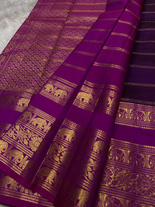 Rani Pink Plum Zari Stripes – Pure Kanchipuram Silk Saree
Plum purple body with rani-pink korvai borders & grand zari pallu
Elephants & floral mandalas woven in gold zari
Silk Mark Certified | Blouse Piece Included | Fall & Pico Done
Free shipping