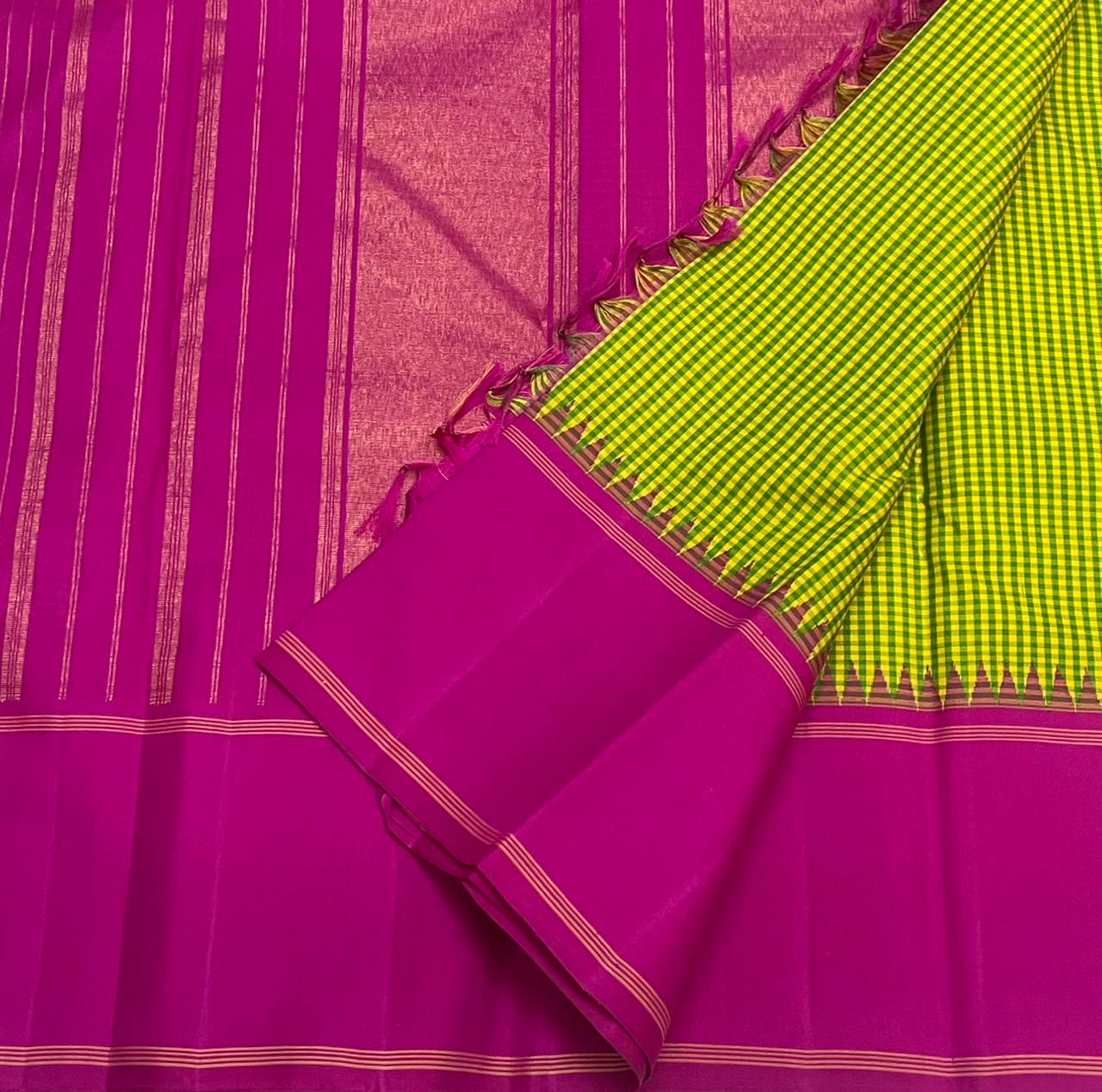 Rose Garden | Korvai Kanchipuram Pure Silk Saree
Magenta-rose body with parrot green micro-checks & temple Korvai join
Rettai pettu striped zari pallu | Contrast magenta blouse
Silk Mark Certified | Dry clean only
Ships in 1 week | Free Shipping USA