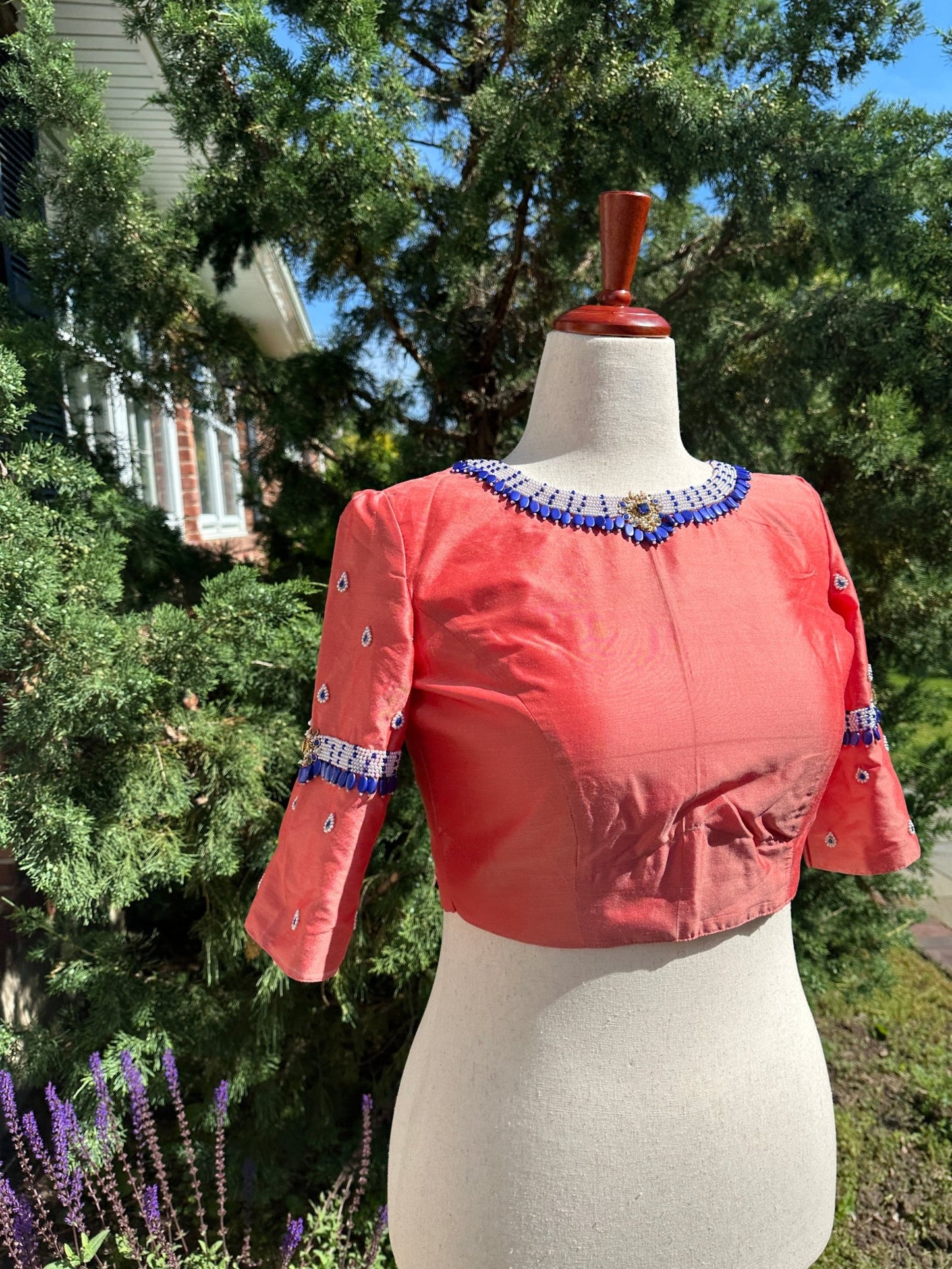 Coral raw silk blouse with emerald bead embroidery styled view