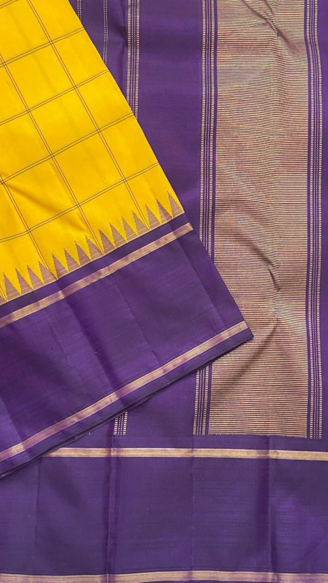Haldi Violet Kattam Korvai
Pure Kanchipuram Silk Saree – Bright Haldi Yellow Checks with Contrasting Violet Korvai Borders
Minimal zari lines for an elegant look
Grand violet pallu with delicate zari stripes, silk mark certified, ships in 2 weeks