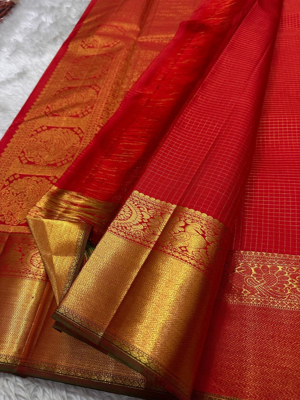 Ravi Kiranam Red Zari Kattam | Pure Silk Kanchipuram
Fiery Kumkum-Red • zari  Checks & Zari Buttas
Grand Gold Zari Border • Brocade Pallu with Ornamental Medallions
Silk Mark Certified • Free Shipping within USA
Ships in Two Weeks | Blouse Stitc