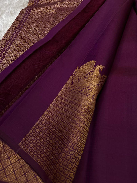 Lotus Glow — Pure Kanchipuram Silk Saree
Deep amethyst-purple with lotus buttas, peacock & elephant zari border
Silk Mark Certified ✅ | Free USA Shipping | Ships in Two Weeks ✅