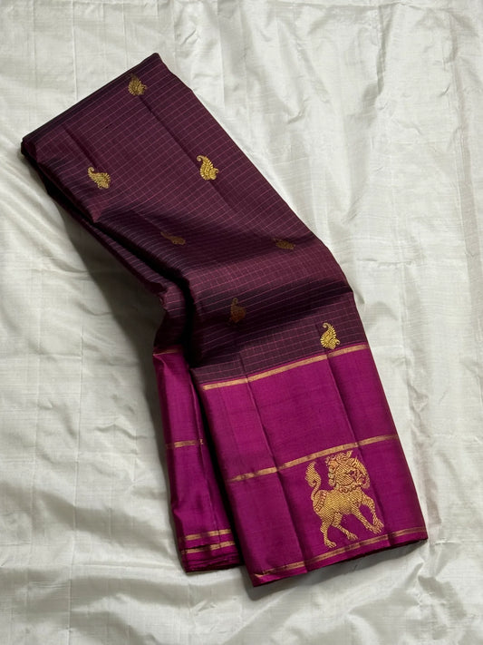 Yazhi Kattam — Pure Kanchipuram Silk Saree
Jamuni plum body with kattam checks & zari ambi buttas
Silk Mark Certified • Free Shipping within USA • Ships in Two Weeks ✅