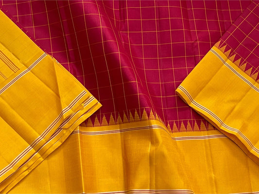 Kattam Kanthi — Pure Silk Kanchipuram Saree
Kalyana arakku body with mustard korvai borders, temple-reku edging & varisaipettu pallu in gold-ochre stripes.
Silk Mark Certified ✅ • Ships in Two Weeks 🚚 • Free Shipping within USA 🇺🇸