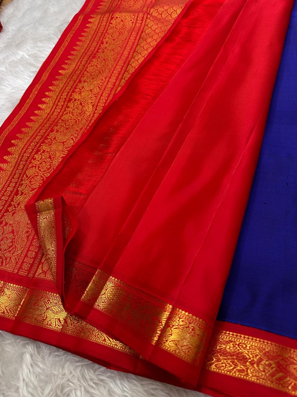 Pure silk Zari kattam butta pink and red saree with peacock, kamalam and kolam motifs