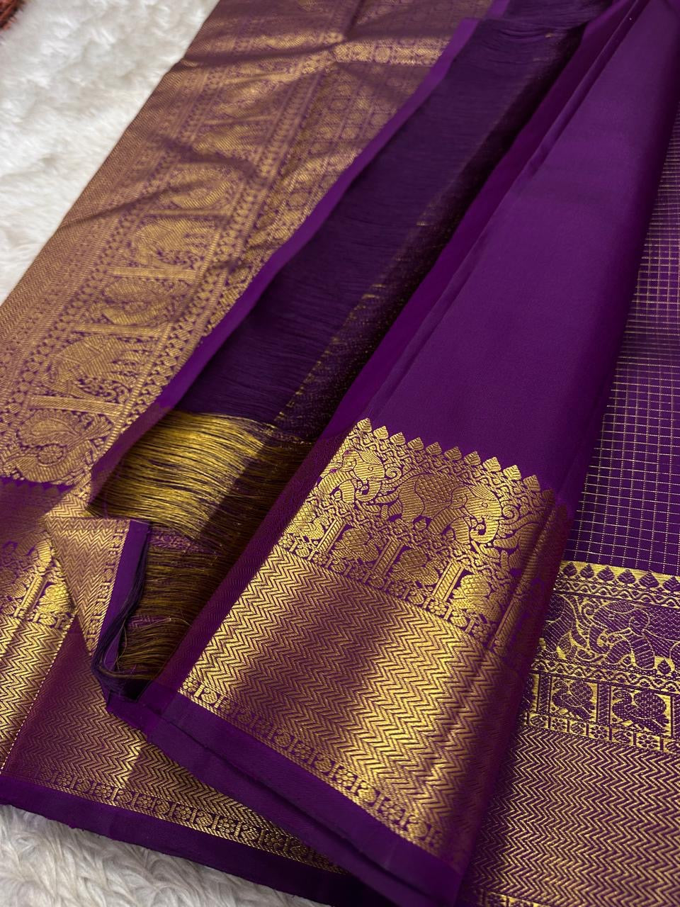 Subha Kattam — Pure Silk Kanchipuram Saree
Vadamalli purple saree with gold buttas & fine kattam checks ✨
Elephant zari borders, grand pallu, Silk Mark Certified ✅ • Free USA Shipping 🇺🇸 • Ships in 2 Weeks 🚚