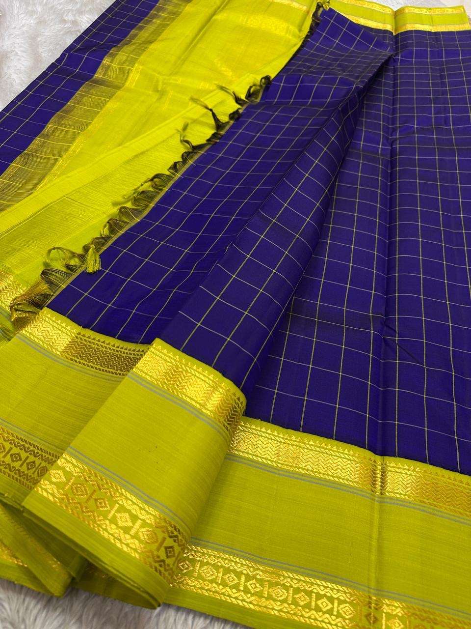 Neelam Parrot Pachai — Pure Kanchipuram Silk Saree
Royal blue body with gold kattam checks & parrot-green korvai border
Silk Mark Certified ✅ | Free USA Shipping | Ships in Two Weeks ✅