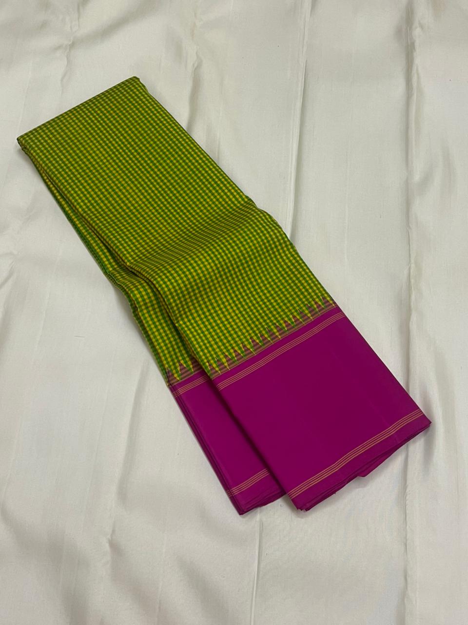 Rose Garden | Korvai Kanchipuram Pure Silk Saree
Magenta-rose body with parrot green micro-checks & temple Korvai join
Rettai pettu striped zari pallu | Contrast magenta blouse
Silk Mark Certified | Dry clean only
Ships in 1 week | Free Shipping USA
