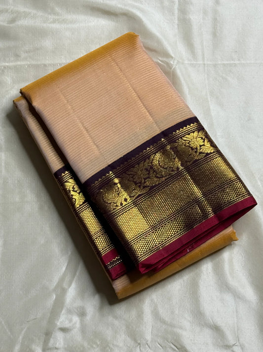 Butterscotch Vairaoosi — Pure Silk Kanchipuram Saree
Sand–butterscotch vaira oosi body • Maroon–plum korvai borders • Antique gold zari floral & peacock weave
Silk Mark Certified ✅ • Fall & Pico Done ✅ • Blouse Stitching Available ($30) ✅ • Ships in Two W