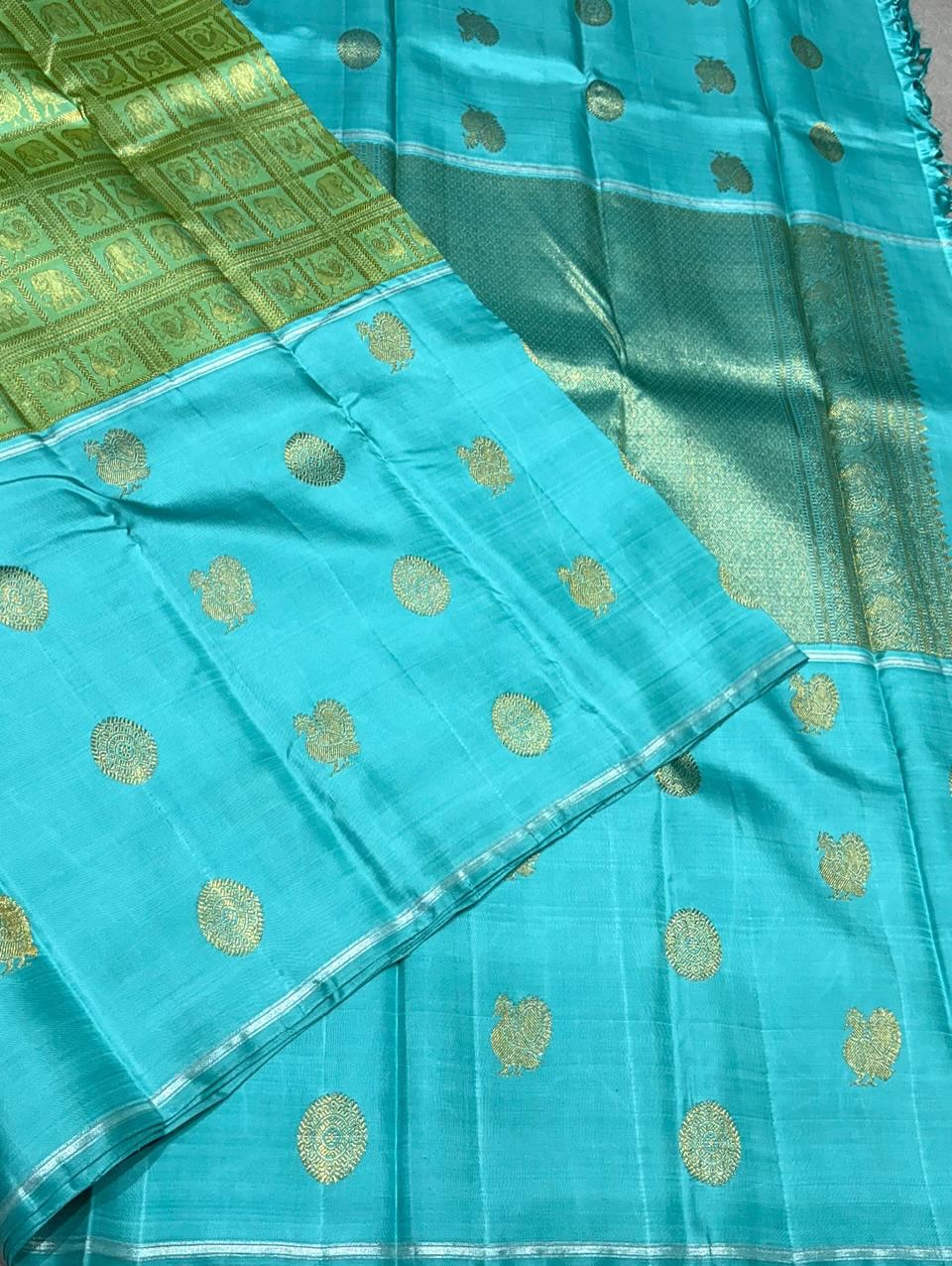 Aaral – Ice Blue & Spring Green Mubbagam Kanchipuram Pure Silk Saree with Mayil Chakram Buttas & Vanasringaram Grid Pallu