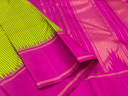 Rose Garden | Korvai Kanchipuram Pure Silk Saree
Magenta-rose body with parrot green micro-checks & temple Korvai join
Rettai pettu striped zari pallu | Contrast magenta blouse
Silk Mark Certified | Dry clean only
Ships in 1 week | Free Shipping USA