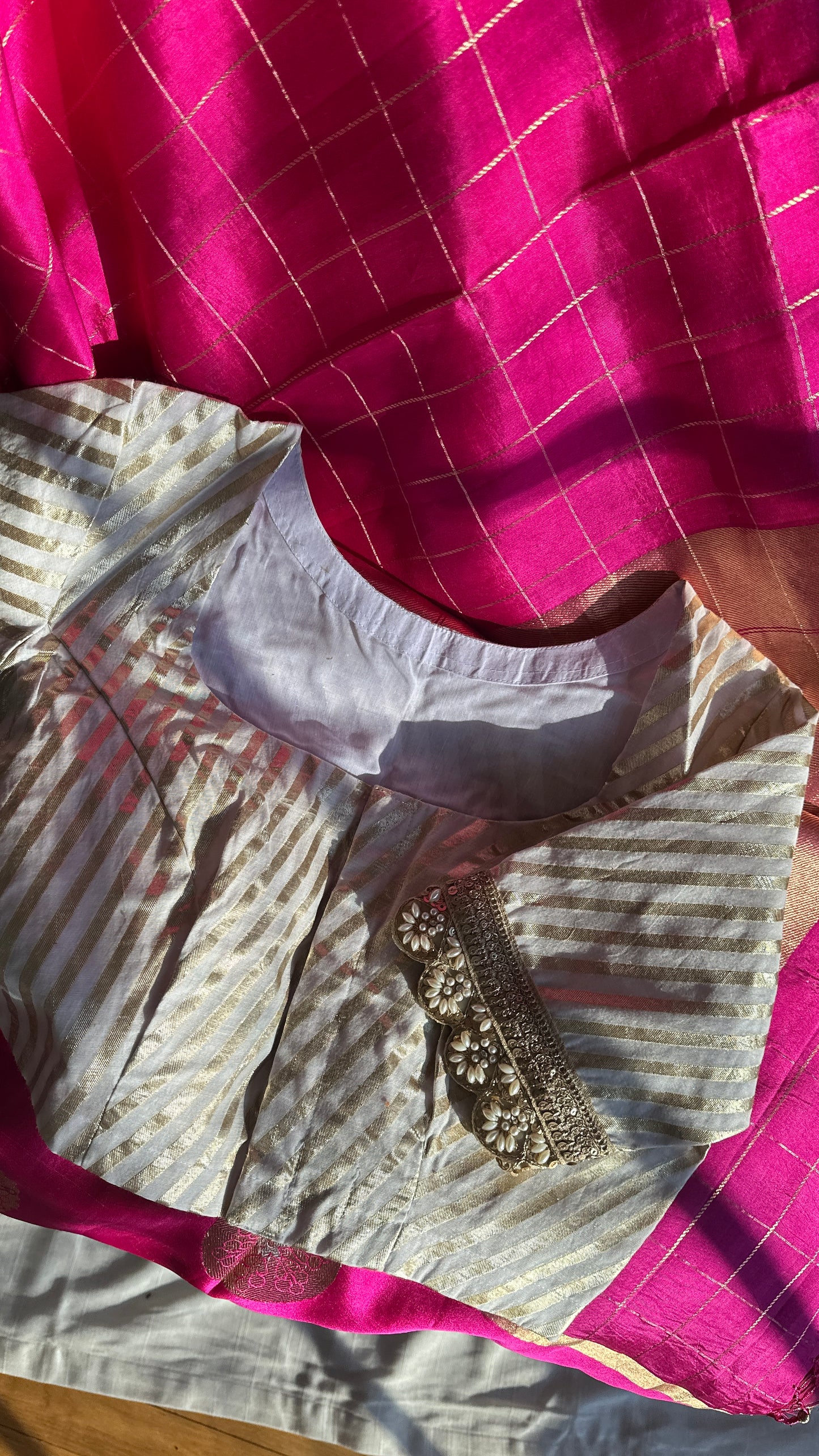 Banarasi soft silk blouse in leheriya pattern with hand embroidered sleeves in cream and gold