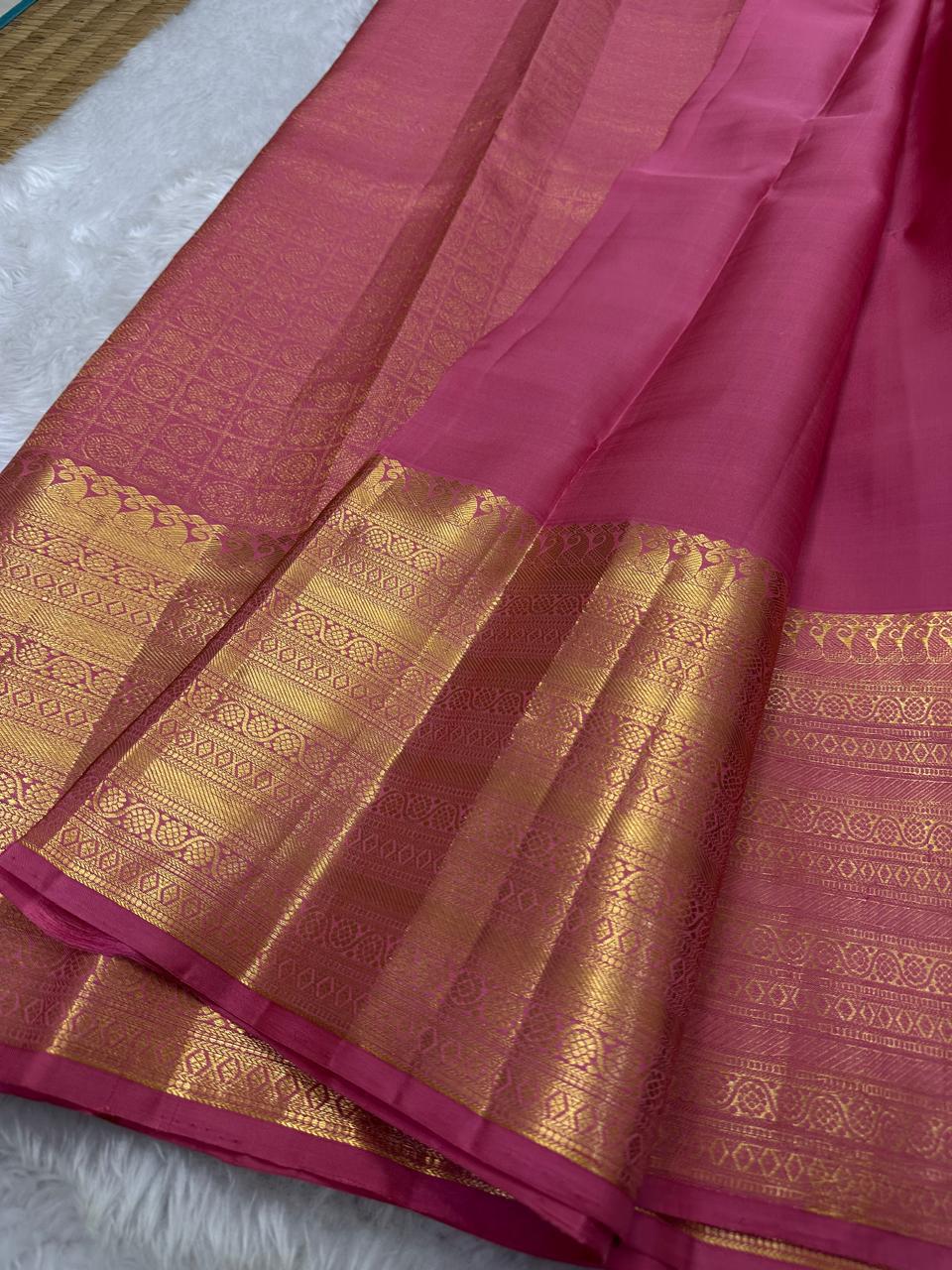 Pretty pink adukkupet pure silk kanjivaram with the Zari Mogra motif inspired by banarasi silks, chakram and mayil grid border