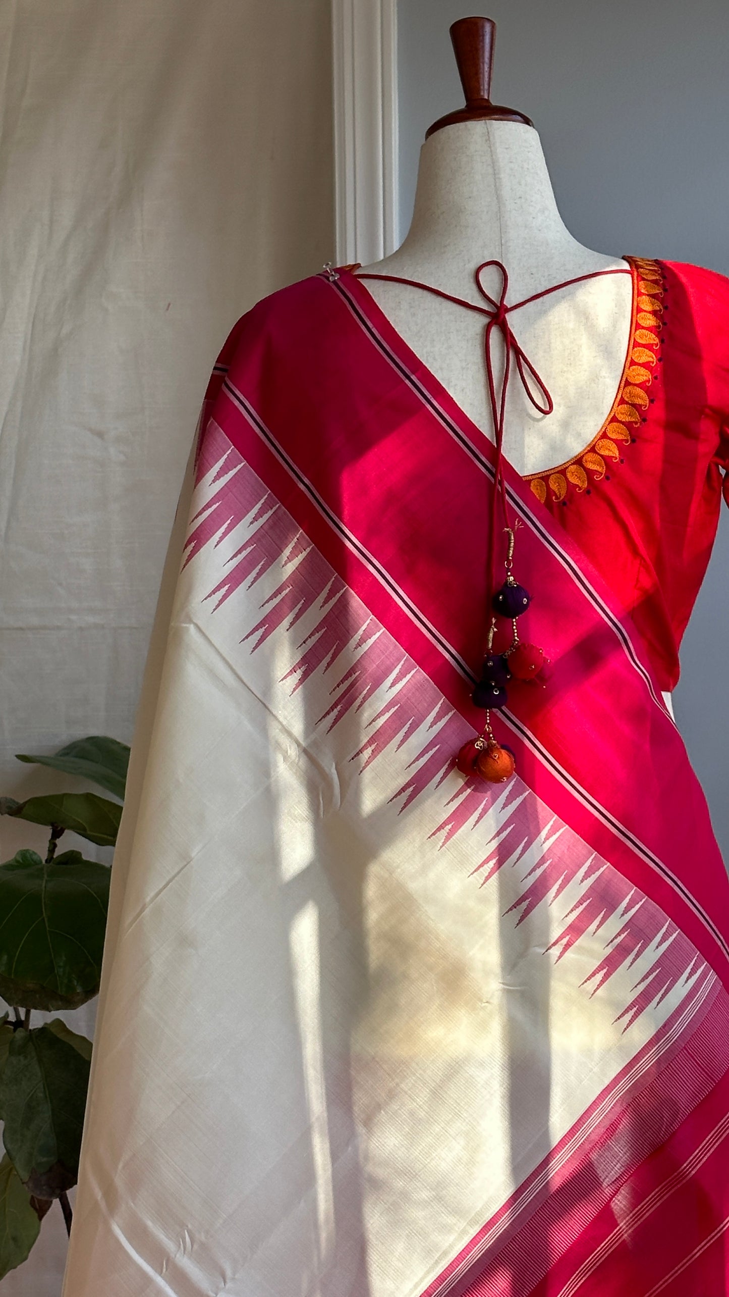"shree" collection - pure silk embroidery blouse with chosen motifs in ikat silk orange red and purple