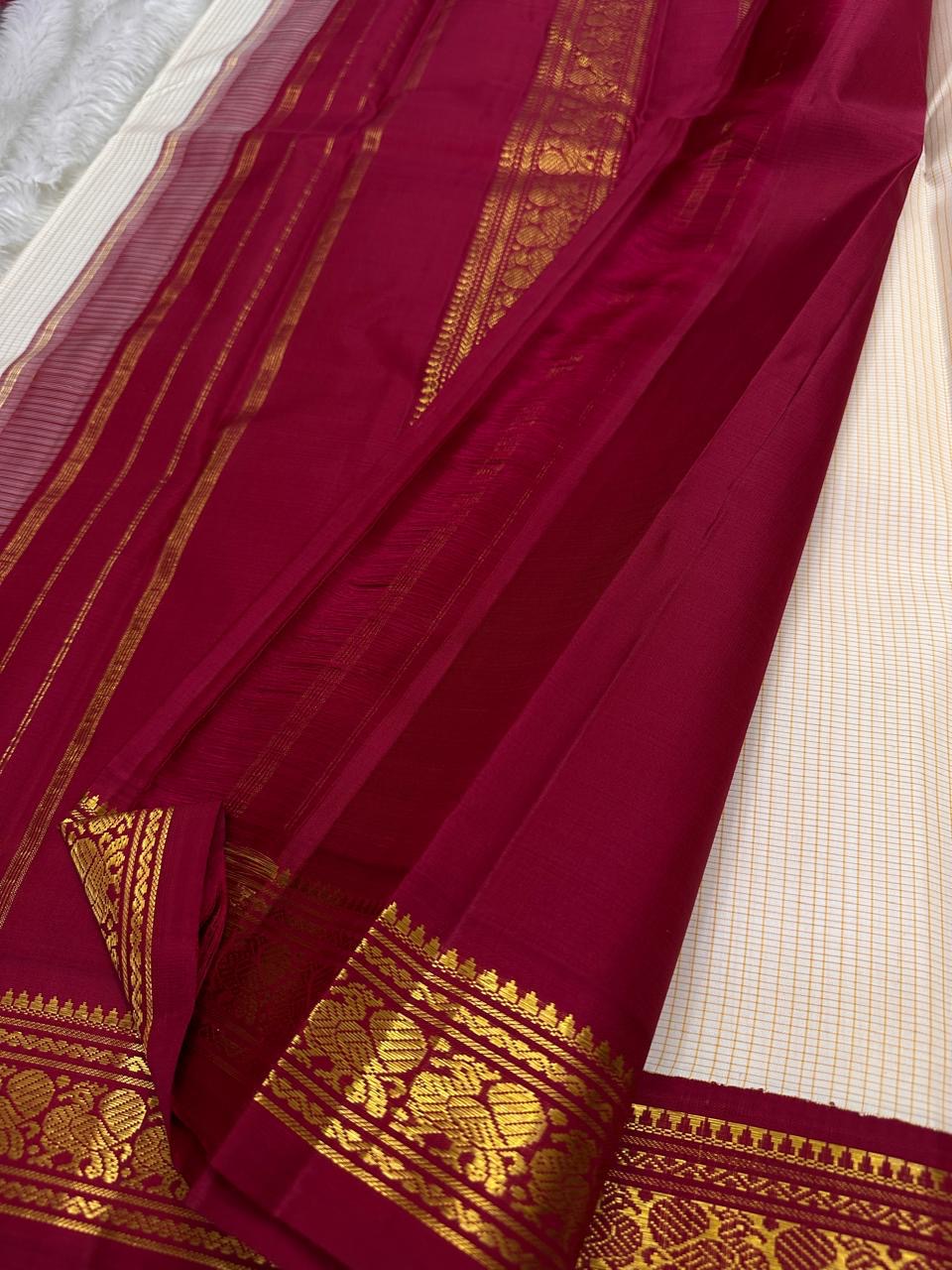 Shwetha Silk Thread Kattam — Pure Kanchipuram Silk Saree
Ivory-beige micro checks with maroon korvai border & gold zari pallu
Silk Mark Certified ✅ | Free USA Shipping | Ships in Two Weeks ✅