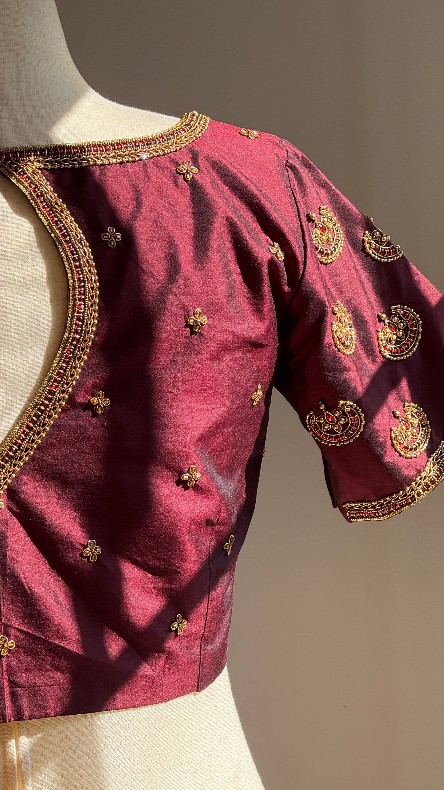 Aarvi – Handwoven Deep Maroon-Brown Silk Blouse with Traditional Maggam Embroidery, Antique Gold Beadwork & Kemp jadau work Stones Inspired by Temple Jewelry- delivery in 3 to 4 weeks