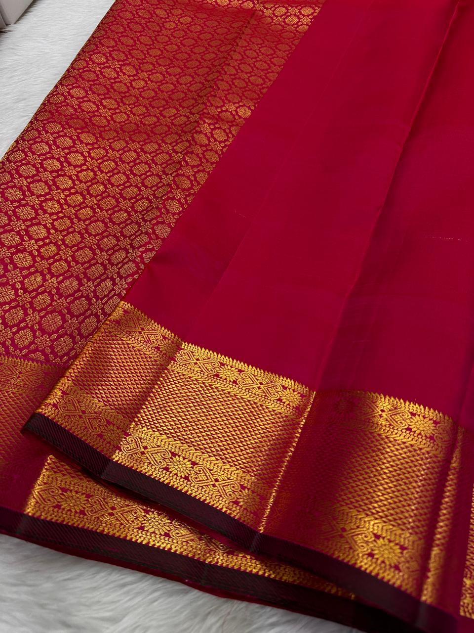 Charita – Tomato Red Kanchipuram Silk Saree
With Bold Zari Kattam Checks & Floral Motifs
Featuring Arai Maadam Border & Rettapet border