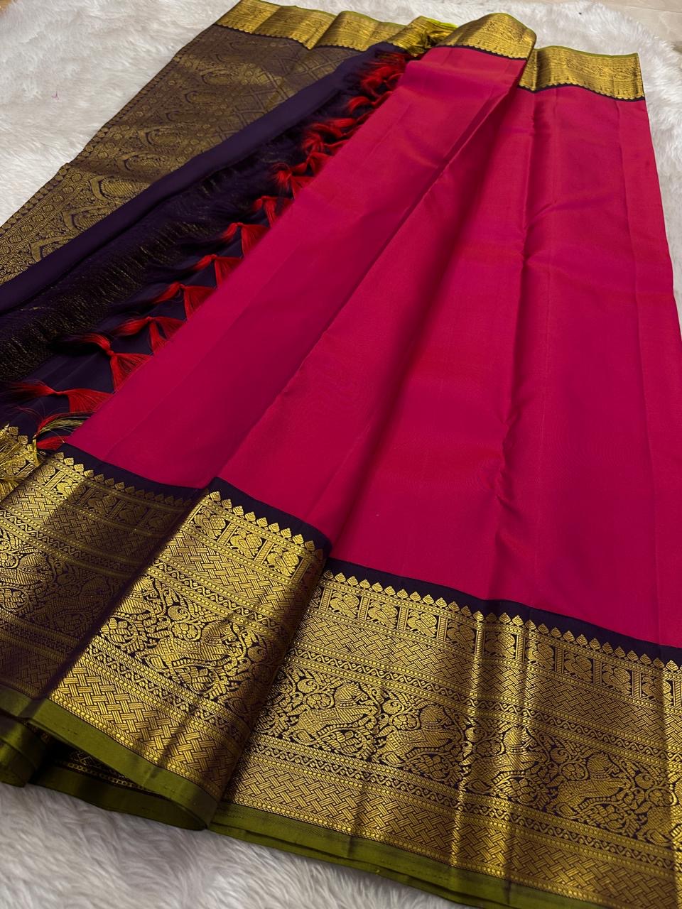 vibrant bright fuschia pink , purple vanasringaram border with a green selvedge !