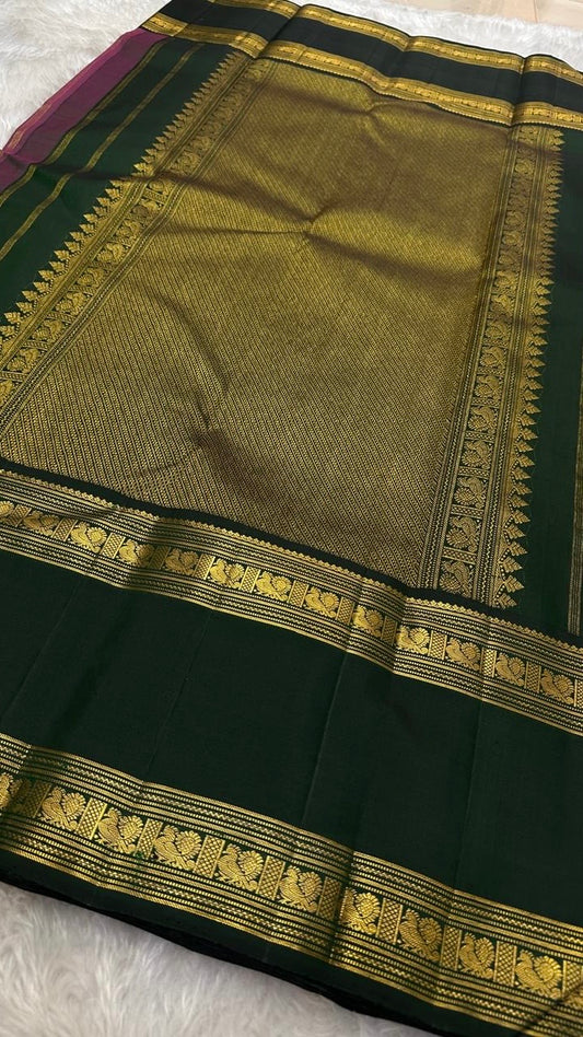 Pure silk kanchipuram handloom saree with tomato pinkish orange body mayil floral butta green border intricate pallu
