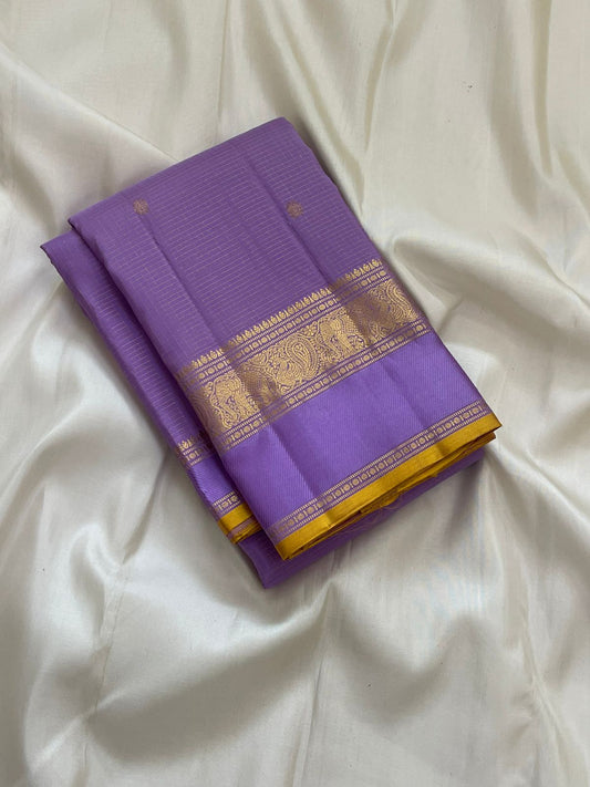 Blooming Lavender — Pure Silk Kanchipuram
Lavender body with oosi-kattam pinstripes, gaja-paisley zari borders & turmeric-gold selvedge ✨
Silk Mark Certified • Antique Zari Weave • Ships in Two Weeks • Free Shipping within USA