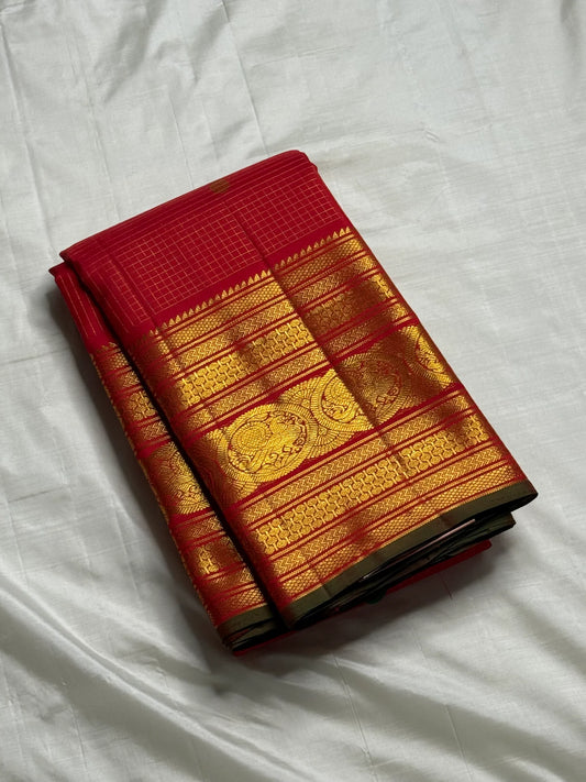 Chandrika — Pure Silk Kanchipuram Saree
Kumkum Red Body with Gold Checks & Coin Buttas | Grand Zari Medallion Borders
Rich Brocade Pallu | Silk Mark Certified ✅ | Free USA Shipping | Ships in Two Weeks ✅